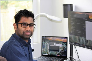 Manabendra Roy works at home on his computer.